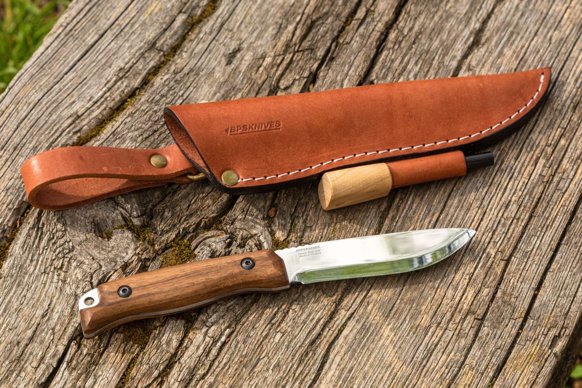 camp knife with sheath and fire starter